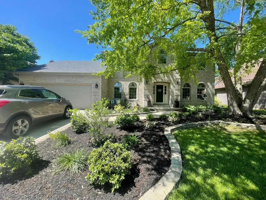 House-driveway-car-parked-landscaping