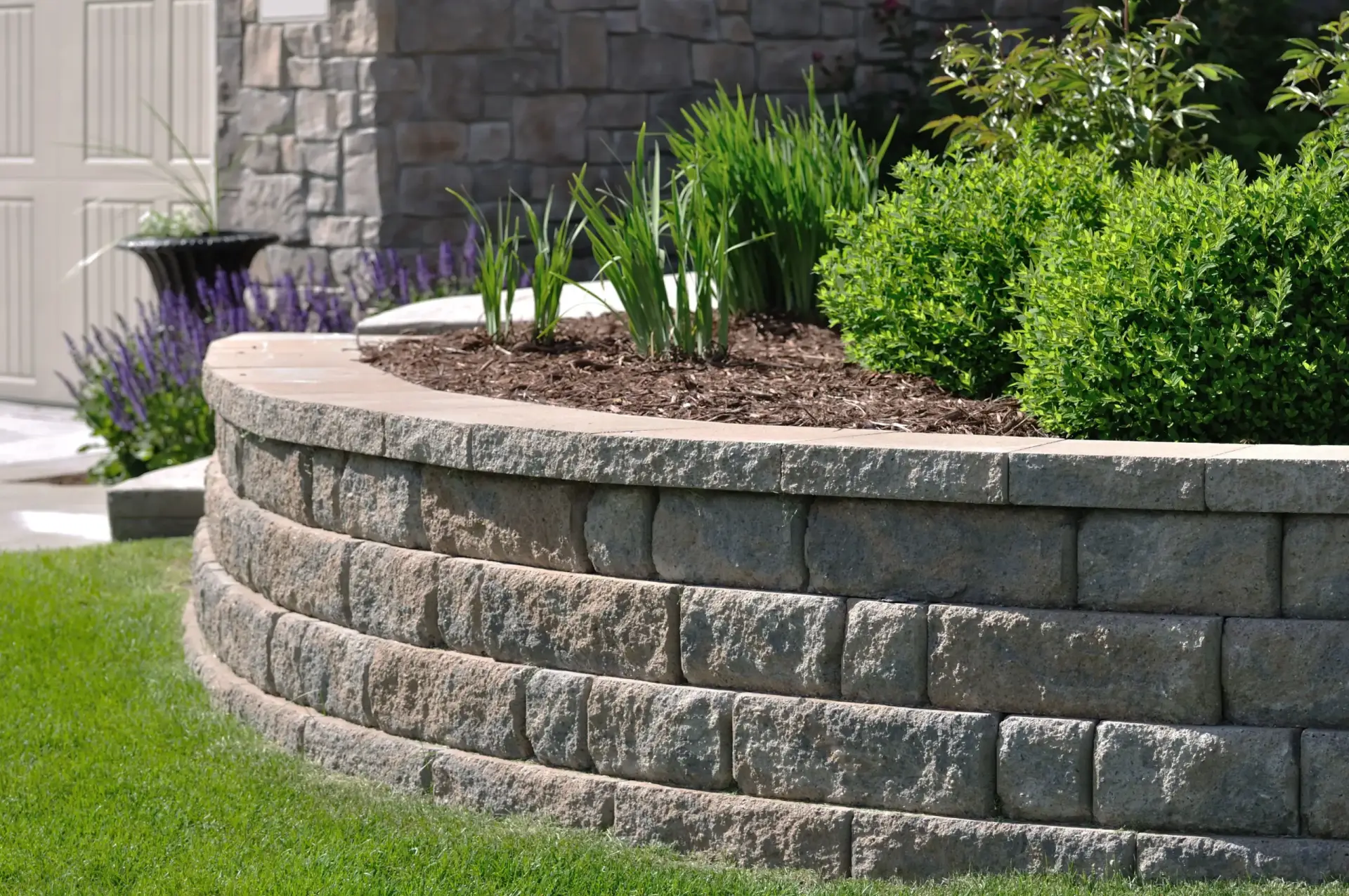 Brick-stone-wall-grass-landscaping