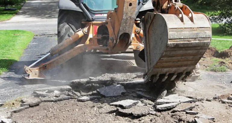 Cracked Driveway or Patio? When to Repair vs. Replace Your Hardscape